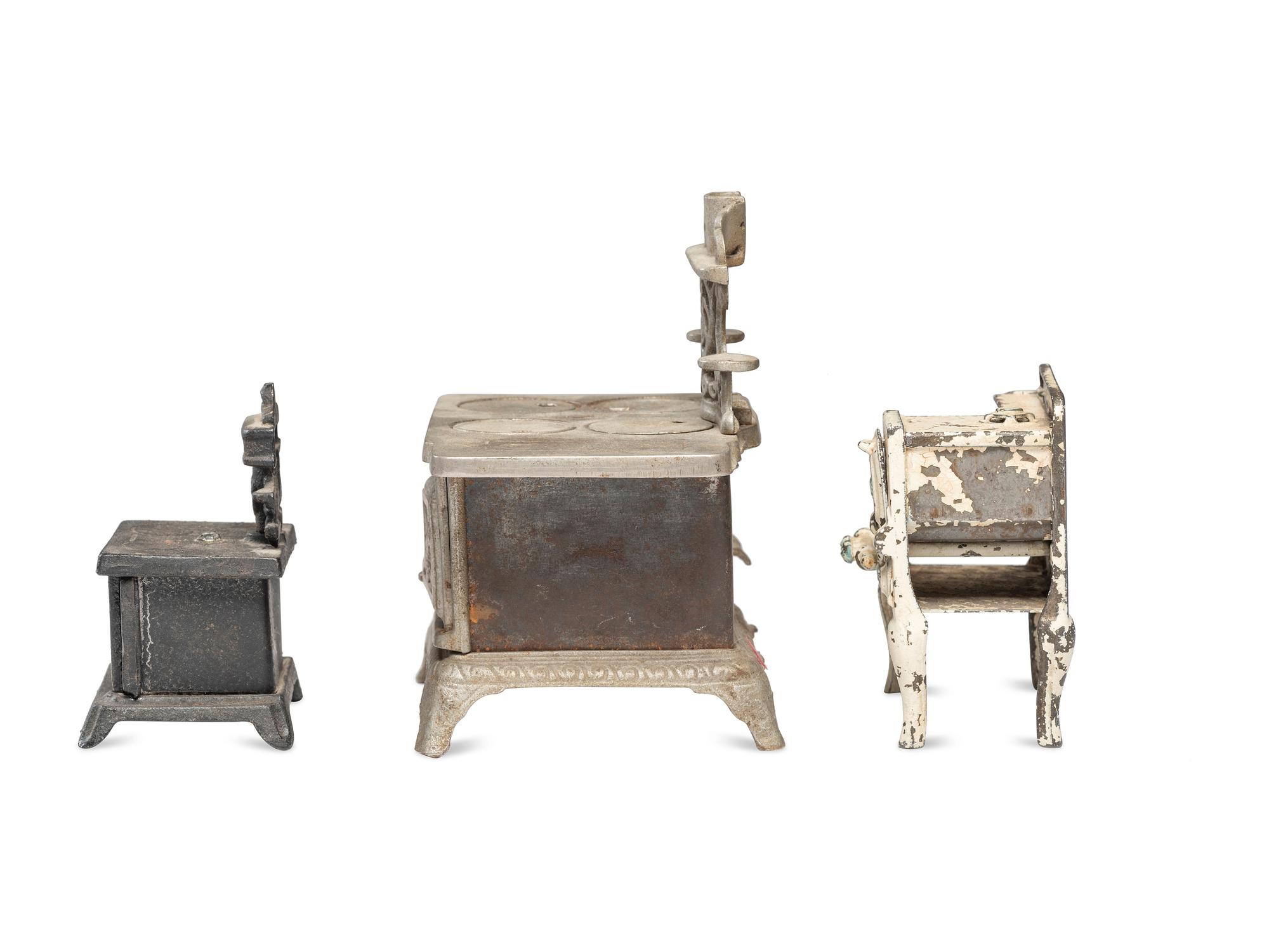 Four Salesman's Sample or Child's Toy Cast Iron Stoves