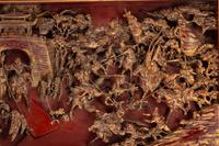 A Large Chinese Pierce-Carved Giltwood Panel Depicting a Battle Scene