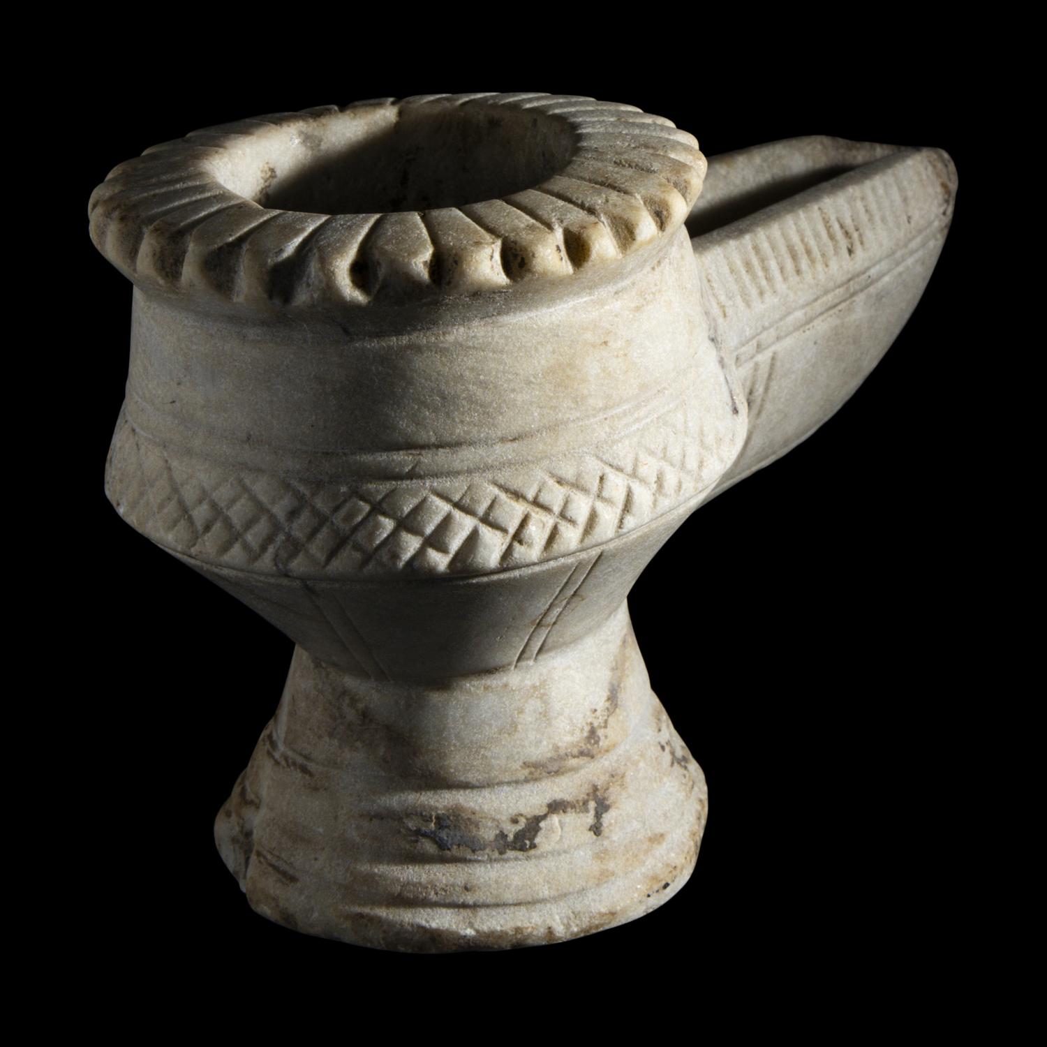 An Islamic Marble Oil Lamp