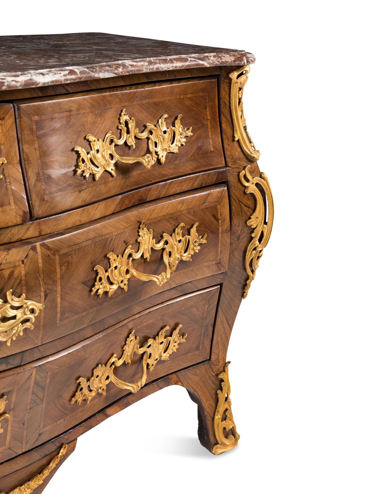 A Louis XV Gilt Bronze Mounted Tulipwood Commode