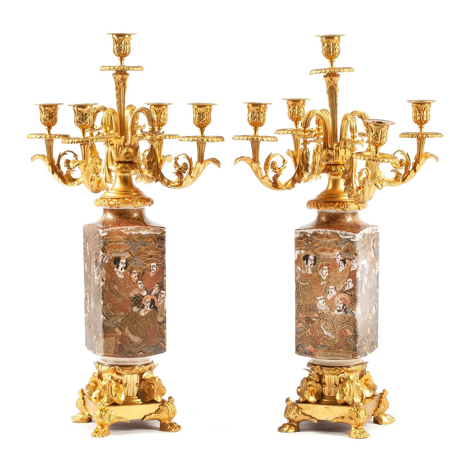 A Pair of Gilt Bronze and Satsuma Porcelain Candelabra Height 23 inches.