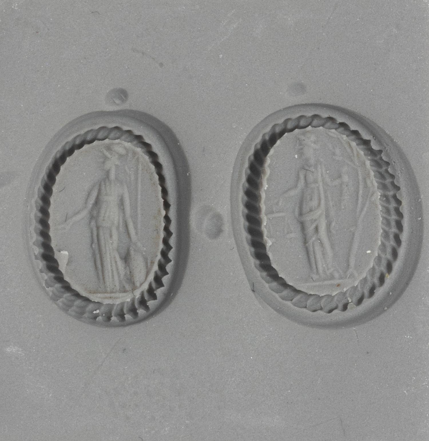 Two Roman Carnelian Ring Stones with the Goddesses Minerva and Themis — Set in a gold brooch