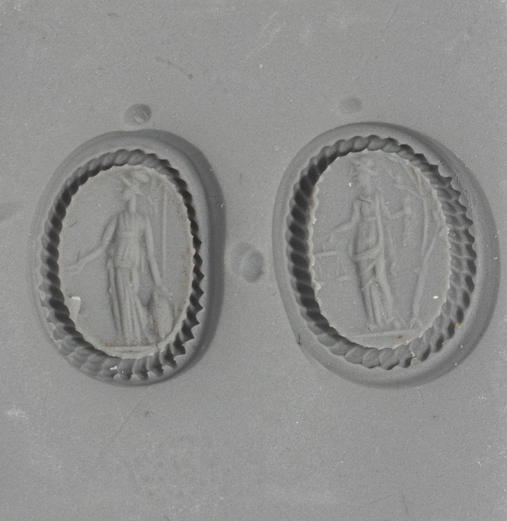 Two Roman Carnelian Ring Stones with the Goddesses Minerva and Themis — Set in a gold brooch