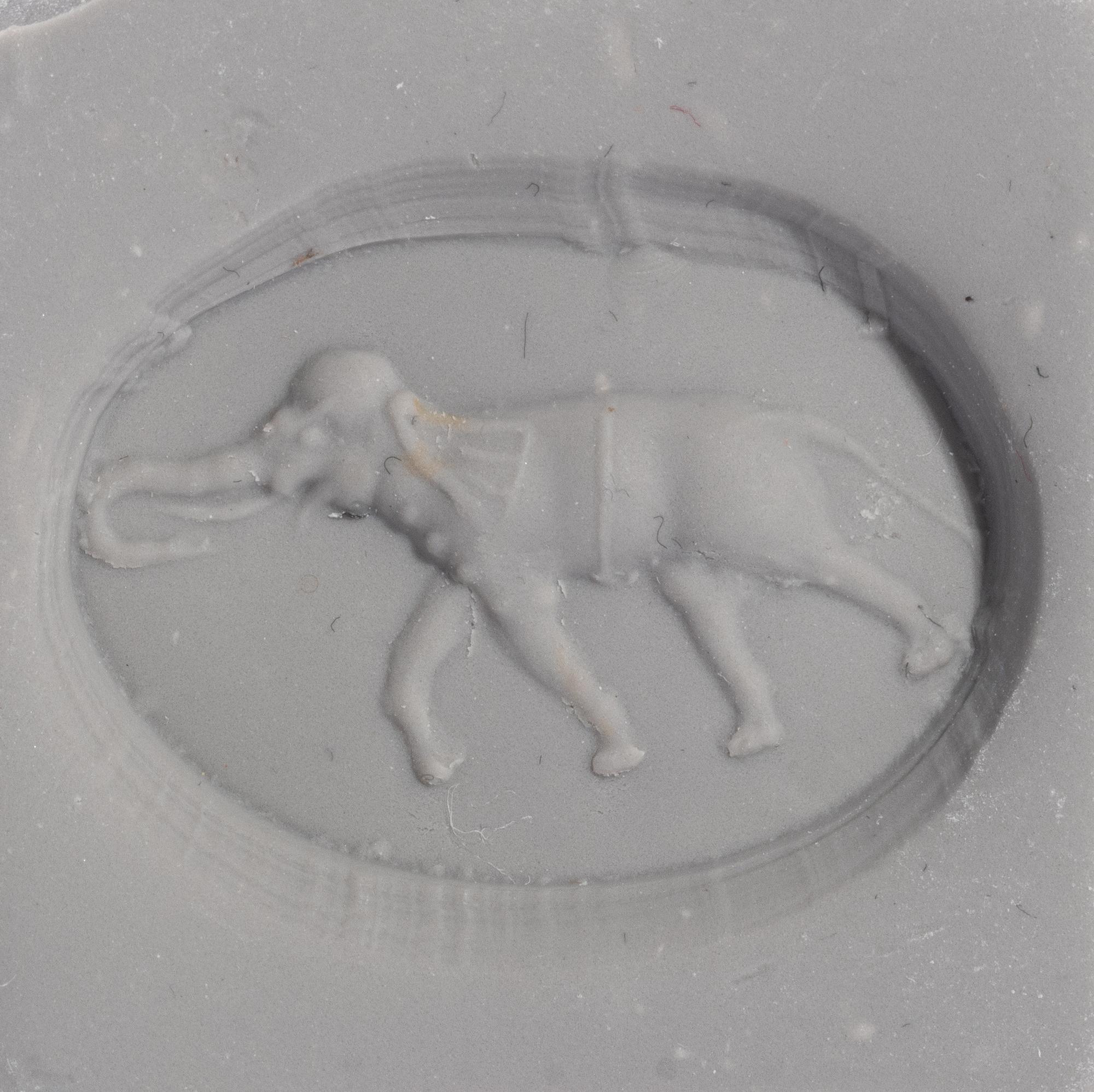 A Greek Carnelian Ringstone with an Elephant