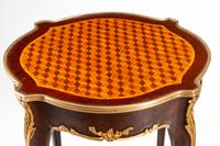 A Pair of Louis XV Style Gilt Bronze Mounted Parquetry Guéridons