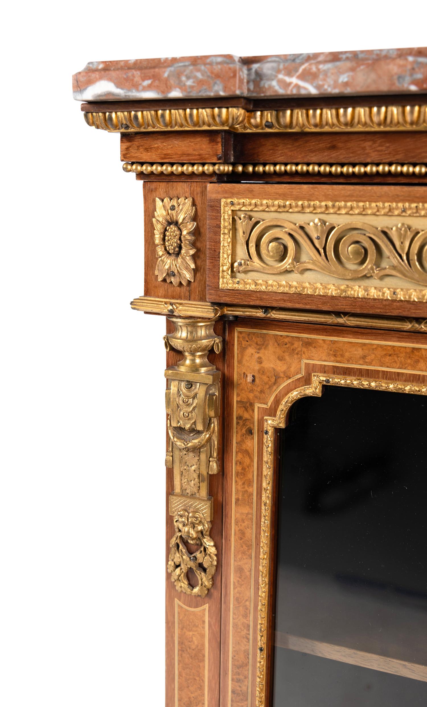 A Louis XVI Style Gilt Bronze Mounted Amaranth, Burr Maple and Kingwood Parquetry Marble-Top Bonheur du Jour