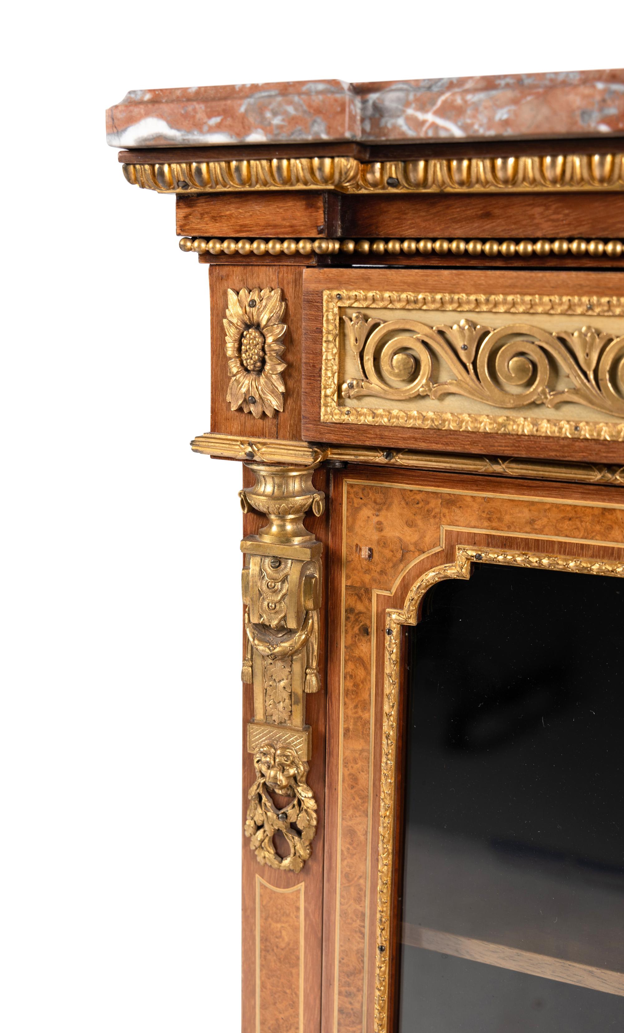 A Louis XVI Style Gilt Bronze Mounted Amaranth, Burr Maple and Kingwood Parquetry Marble-Top Bonheur du Jour