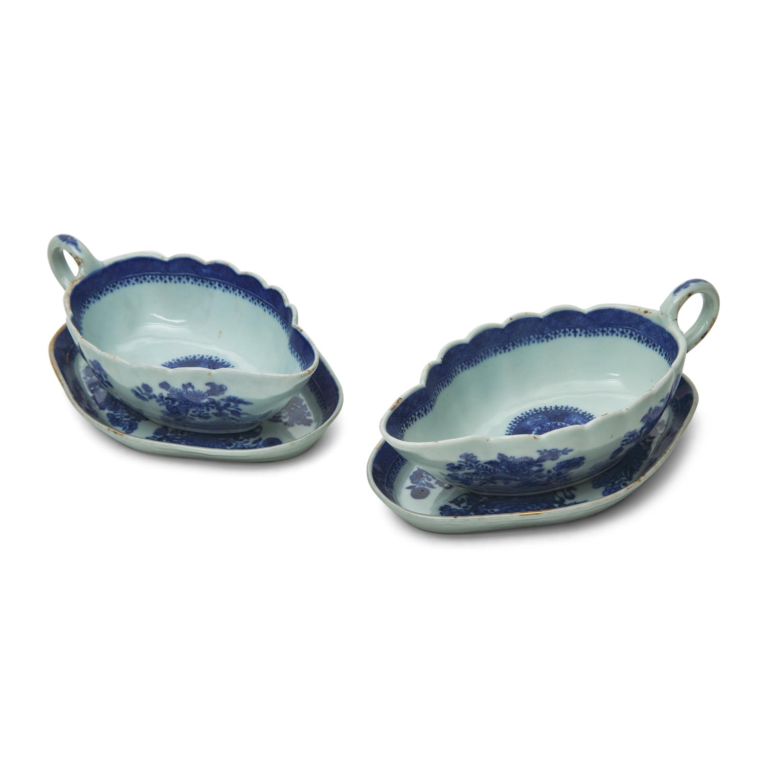 A Pair of Chinese Export Porcelain Fitzhugh Sauce Boats and Stands