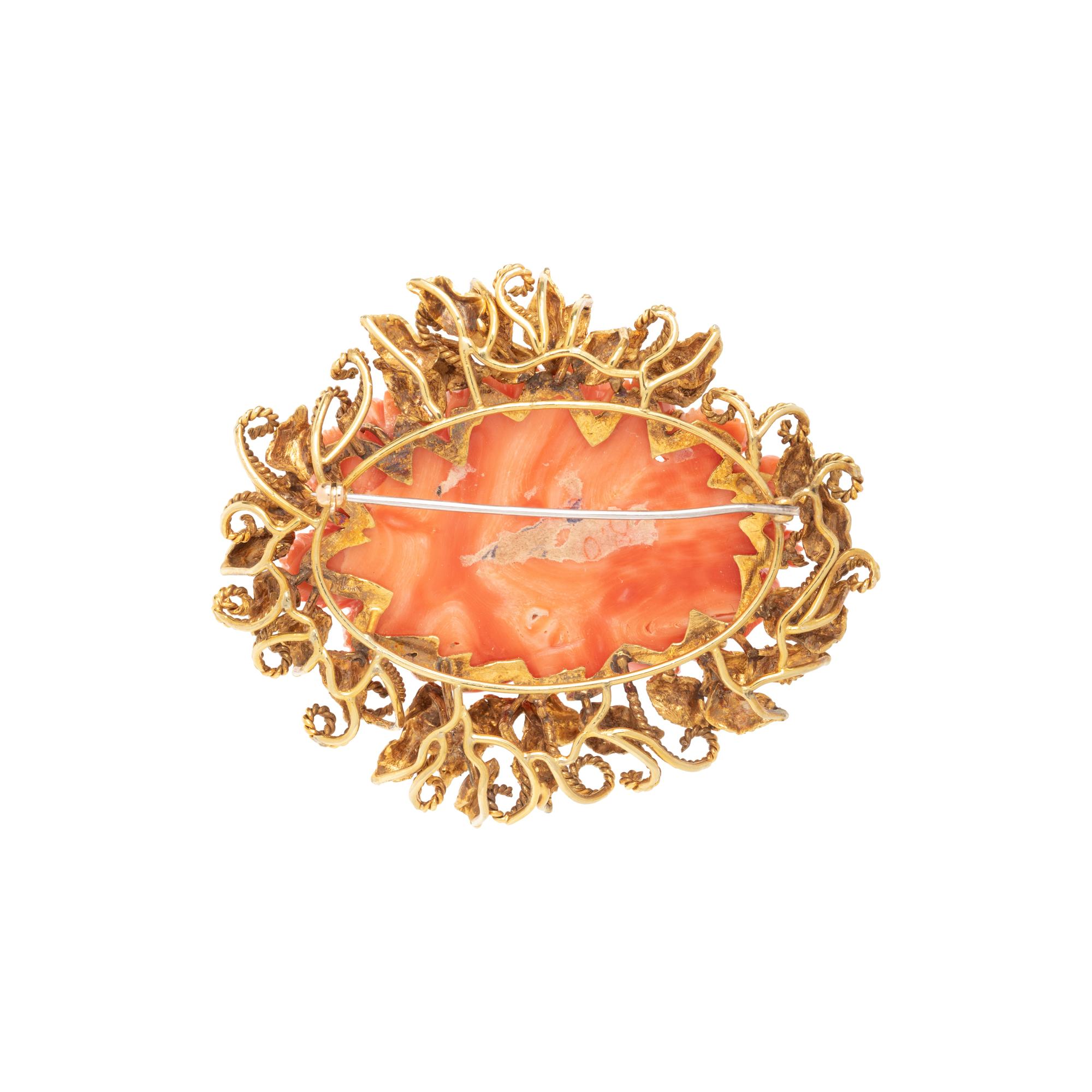 YELLOW GOLD AND CARVED CORAL BROOCH