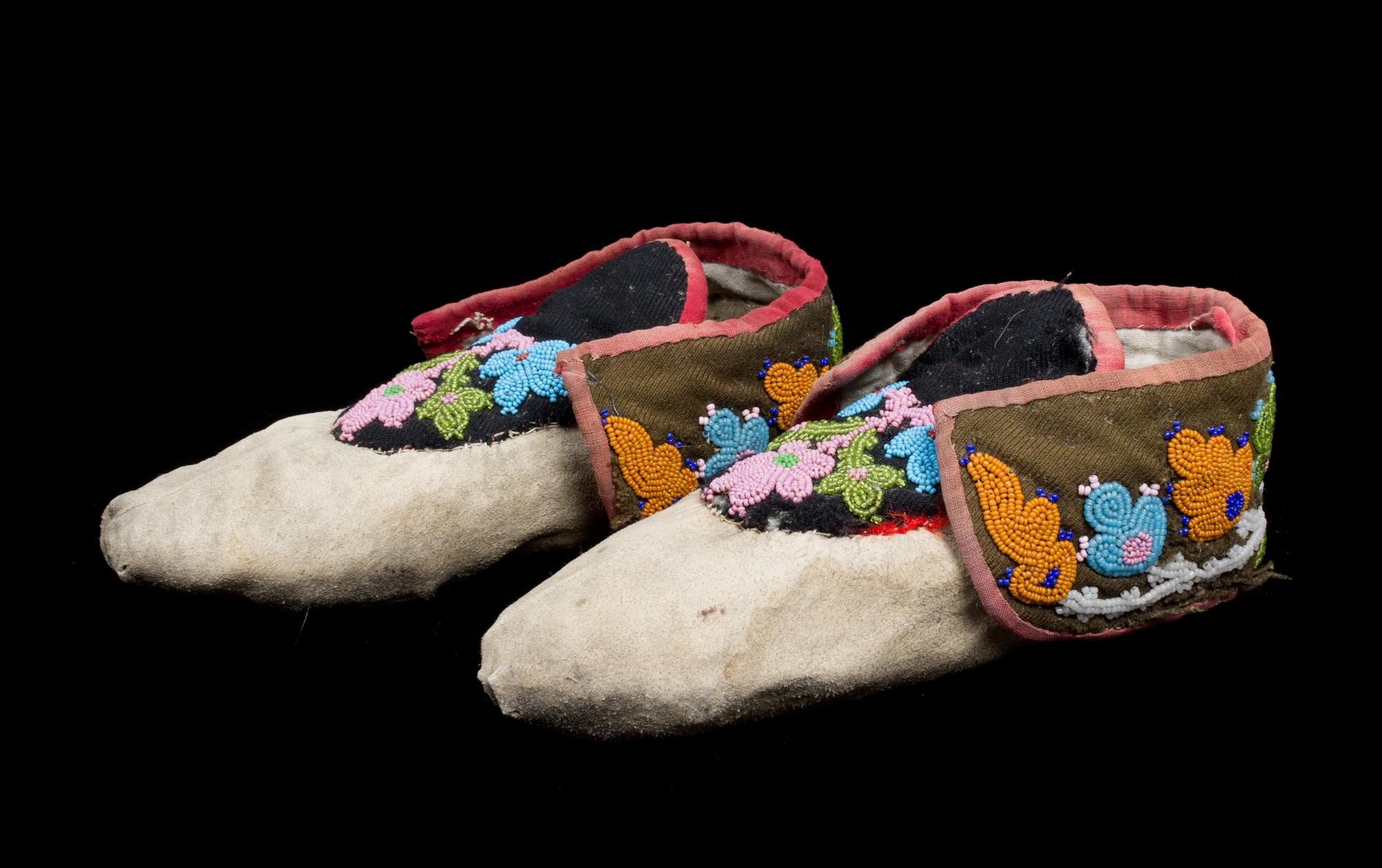 Five Pairs of Great Lakes Region Beaded Moccasins Length of largest 11 inches.