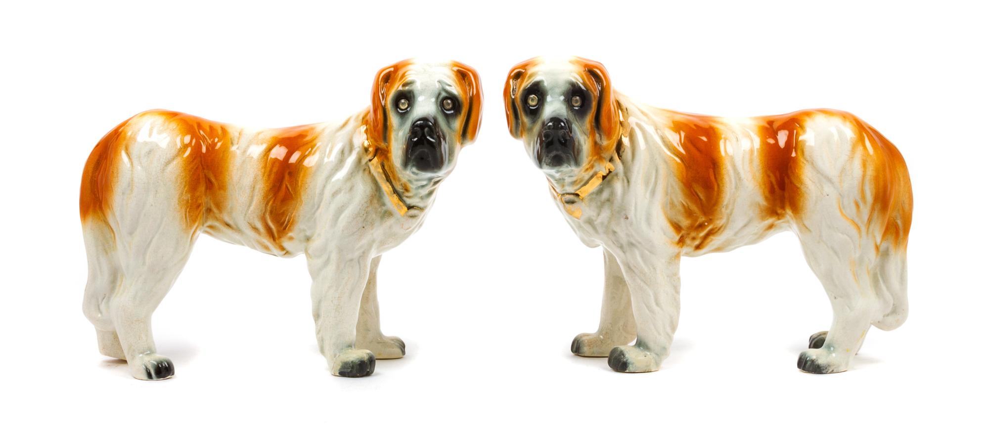 A Pair of Staffordshire Saint Bernard Figures Width of each 13 inches.