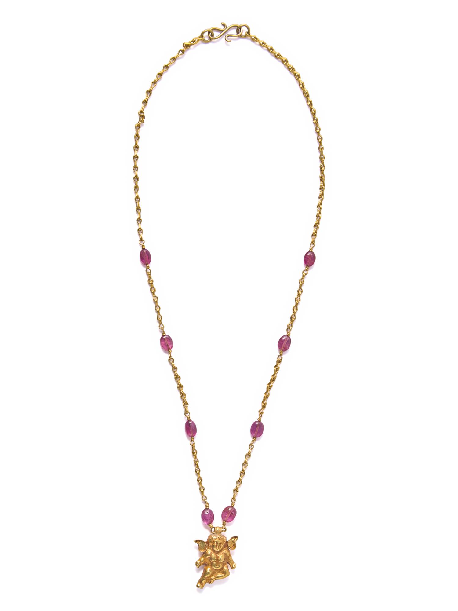 A Hellenistic Gold Eros Pendant — with a modern gold and pink spinel beads chain