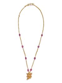 A Hellenistic Gold Eros Pendant — with a modern gold and pink spinel beads chain
