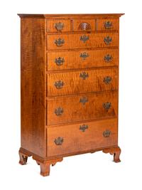 A Chippendale Style Tiger Maple Tall Chest