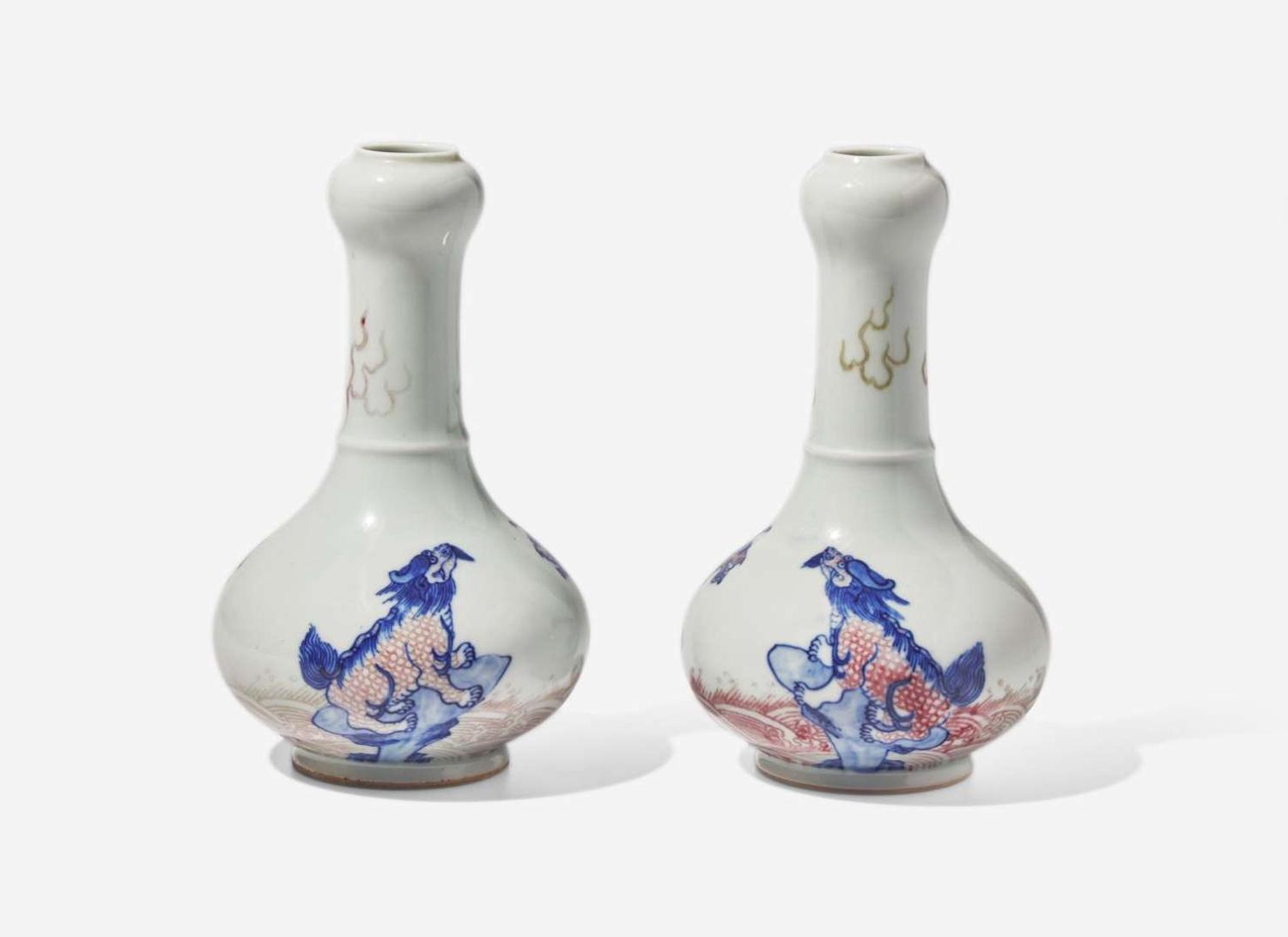 A pair of Chinese underglaze blue and red garlic-head cabinet vases, Kangxi marks 青花釉裡紅蒜頭瓶一對 康熙款