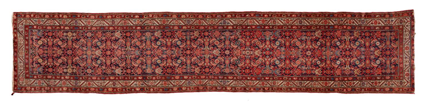 A Malayer Wool Runner 16 feet 7 inches x 3 feet 3 inches. — CIRCA 1900