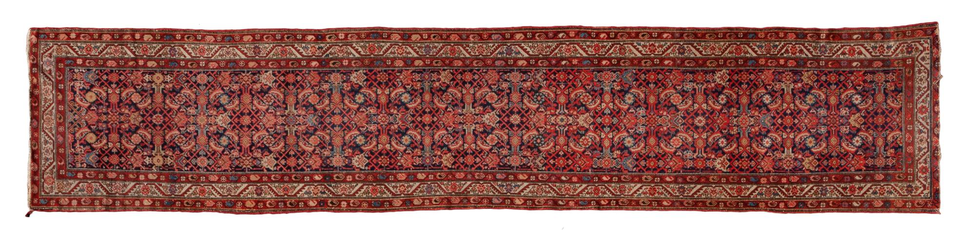A Malayer Wool Runner 16 feet 7 inches x 3 feet 3 inches. — CIRCA 1900