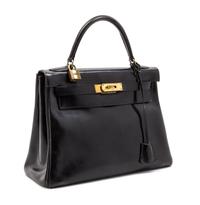 An Hermes 28cm Black Calf Leather Kelly Bag, 11 x 8 x 4 1/2 inches.