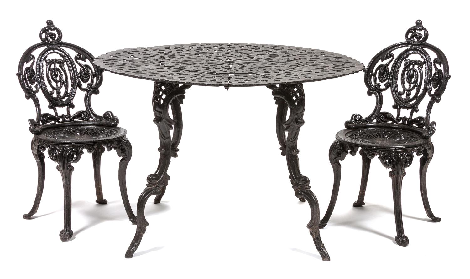 A Victorian Style Wrought Iron Patio Set Height of chairs 31 1/2 inches. — 20TH CENTURY