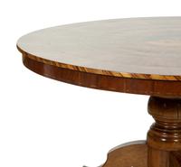 An Italian Walnut and Marquetry Tilt-Top Dining Table