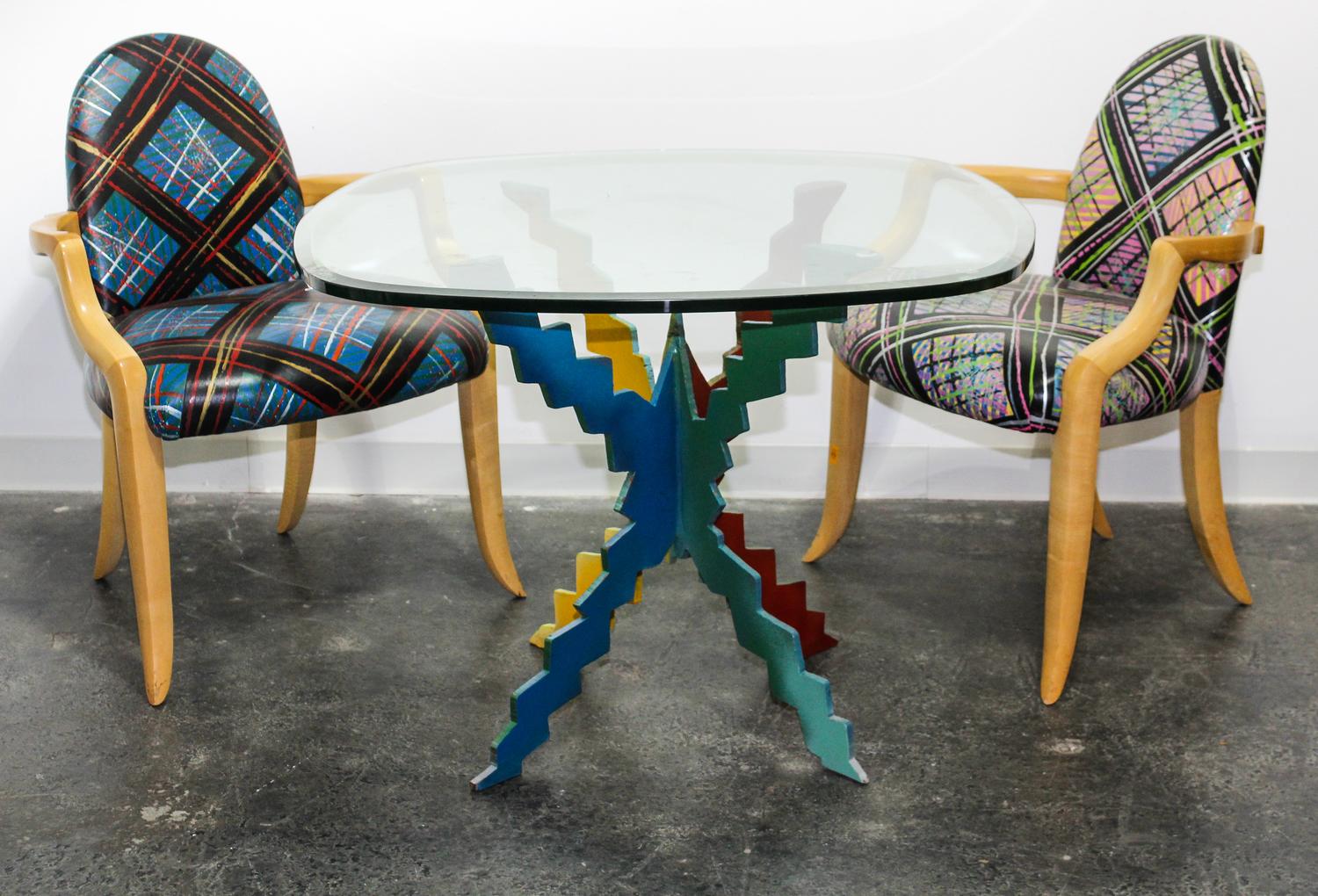 Style of Peter Dudley, , a table and four chairs