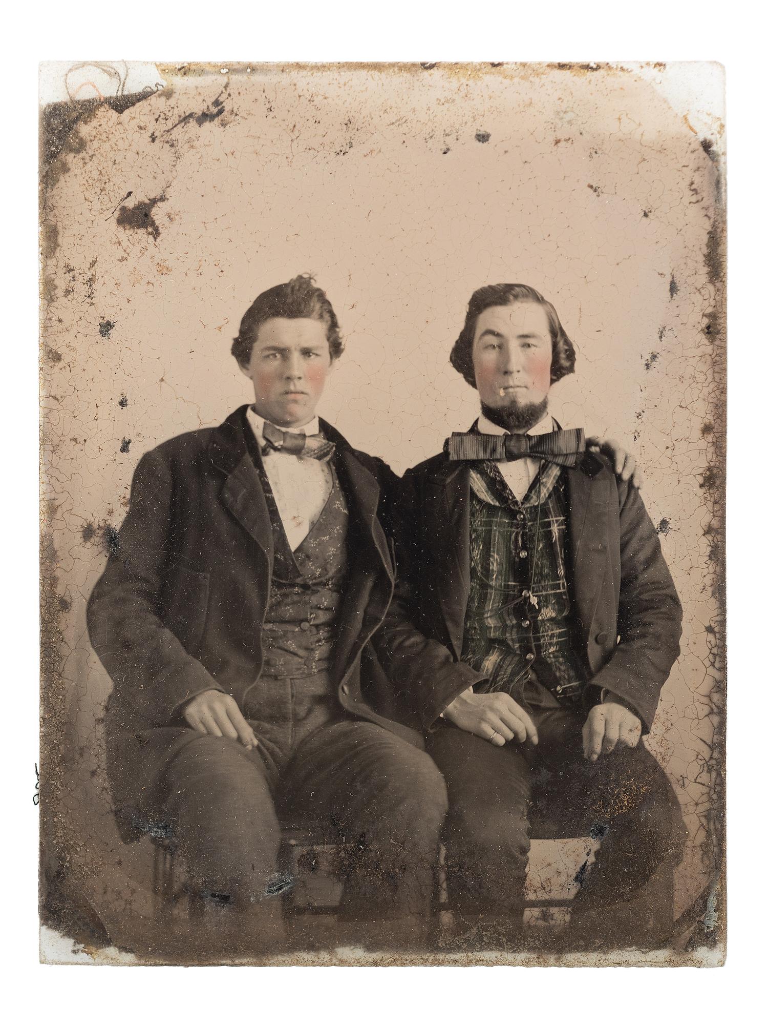 [CIVIL WAR]. Sixth plate ambrotype of CSA soldier John Adams, Jr., possibly from Company, B, 16th South Carolina Volunteers, holding a Confederate-made Spiller & Burr revolver, with civilian portrait.