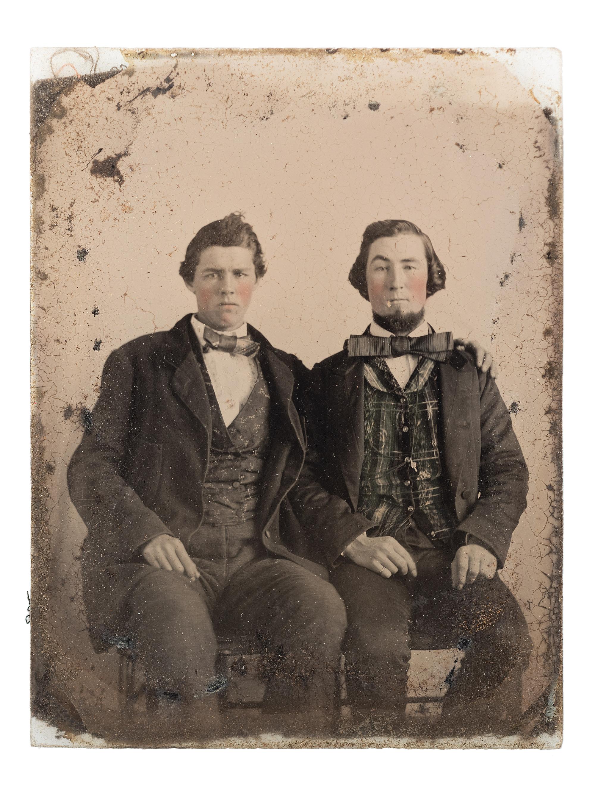 [CIVIL WAR]. Sixth plate ambrotype of CSA soldier John Adams, Jr., possibly from Company, B, 16th South Carolina Volunteers, holding a Confederate-made Spiller & Burr revolver, with civilian portrait.
