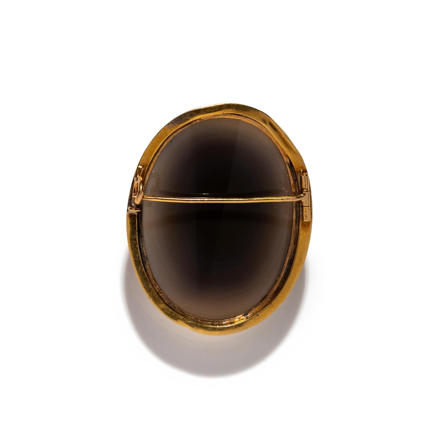 A Neoclassical Gold and Sardonyx Cameo Brooch with a Portrait Head of a Goddess