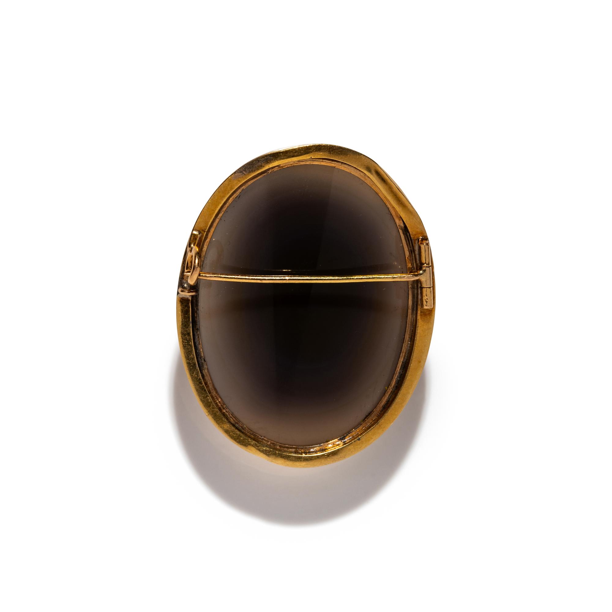 A Neoclassical Gold and Sardonyx Cameo Brooch with a Portrait Head of a Goddess