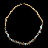 An Western Asiatic Stone Beaded Necklace with Ancient Gold Spacers