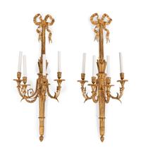 A Pair of Louis XVI Style Gilt Bronze Four-Light Wall Sconces