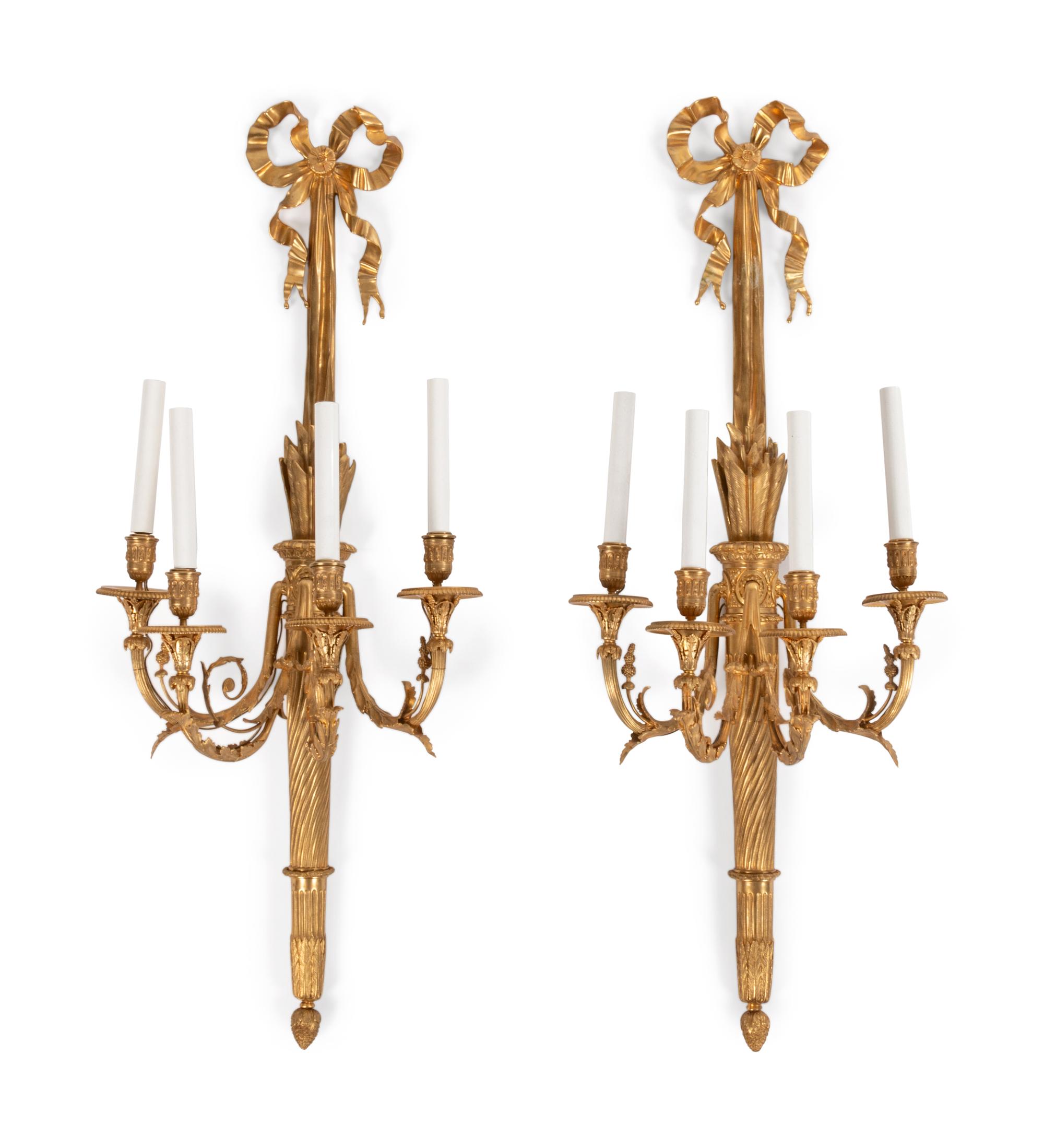 A Pair of Louis XVI Style Gilt Bronze Four-Light Wall Sconces