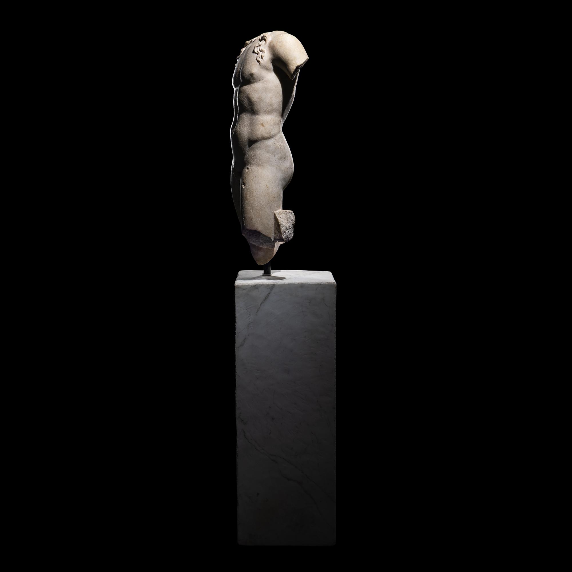 A Roman Marble Torso of a Youthful God