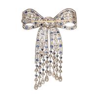EVELYN CLOTHIER, DIAMOND AND SAPPHIRE BOW BROOCH