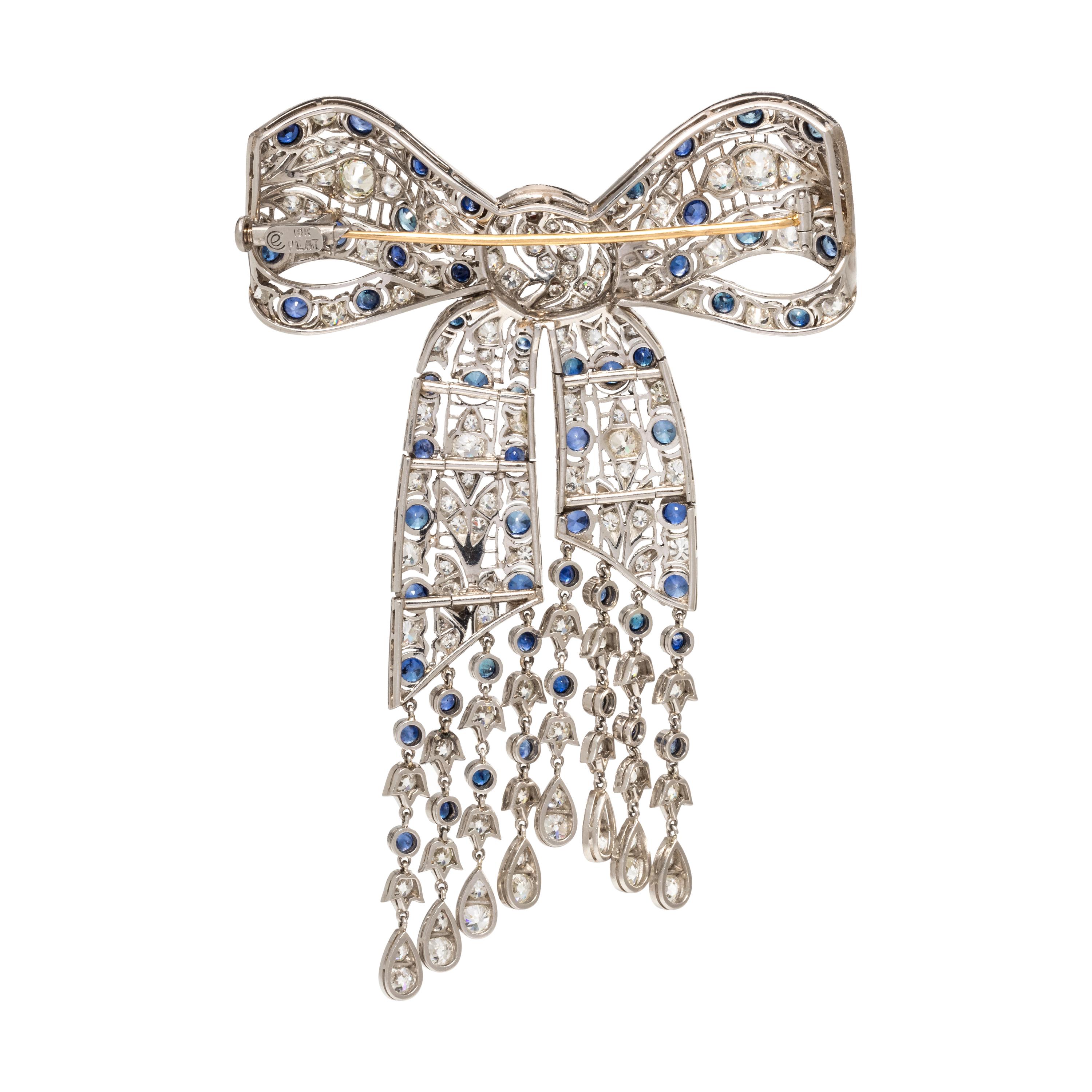 EVELYN CLOTHIER, DIAMOND AND SAPPHIRE BOW BROOCH