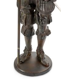 A Pair of Cast Metal Figural Torchères