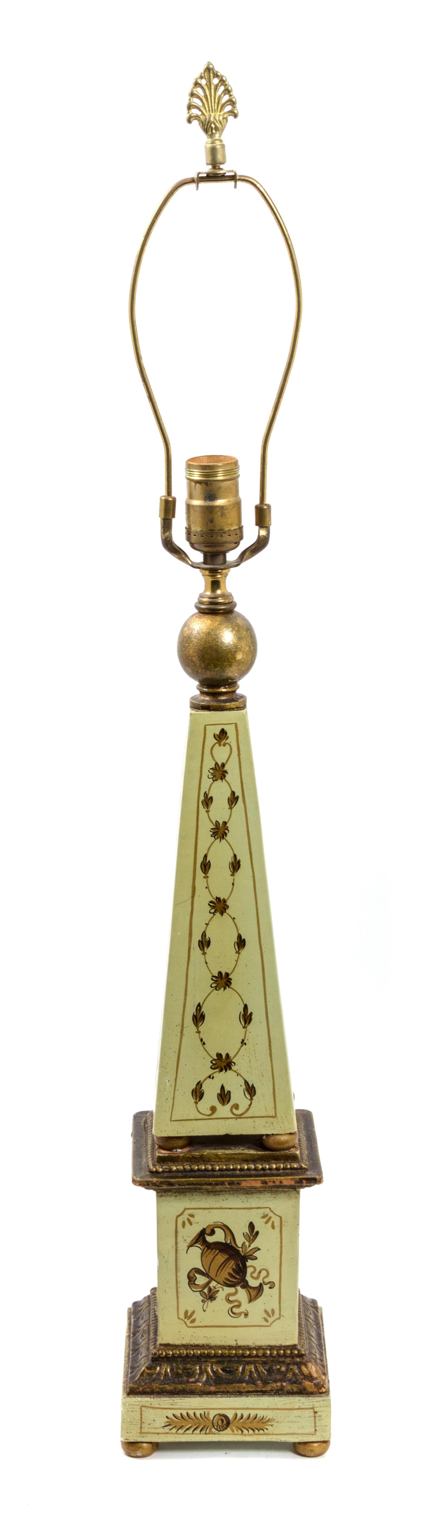 A Painted Ceramic and Gilt Obelisk-Form Table Lamp Height 32 x width 5 1/4 x depth 5 1/4 inches. — 20TH CENTURY