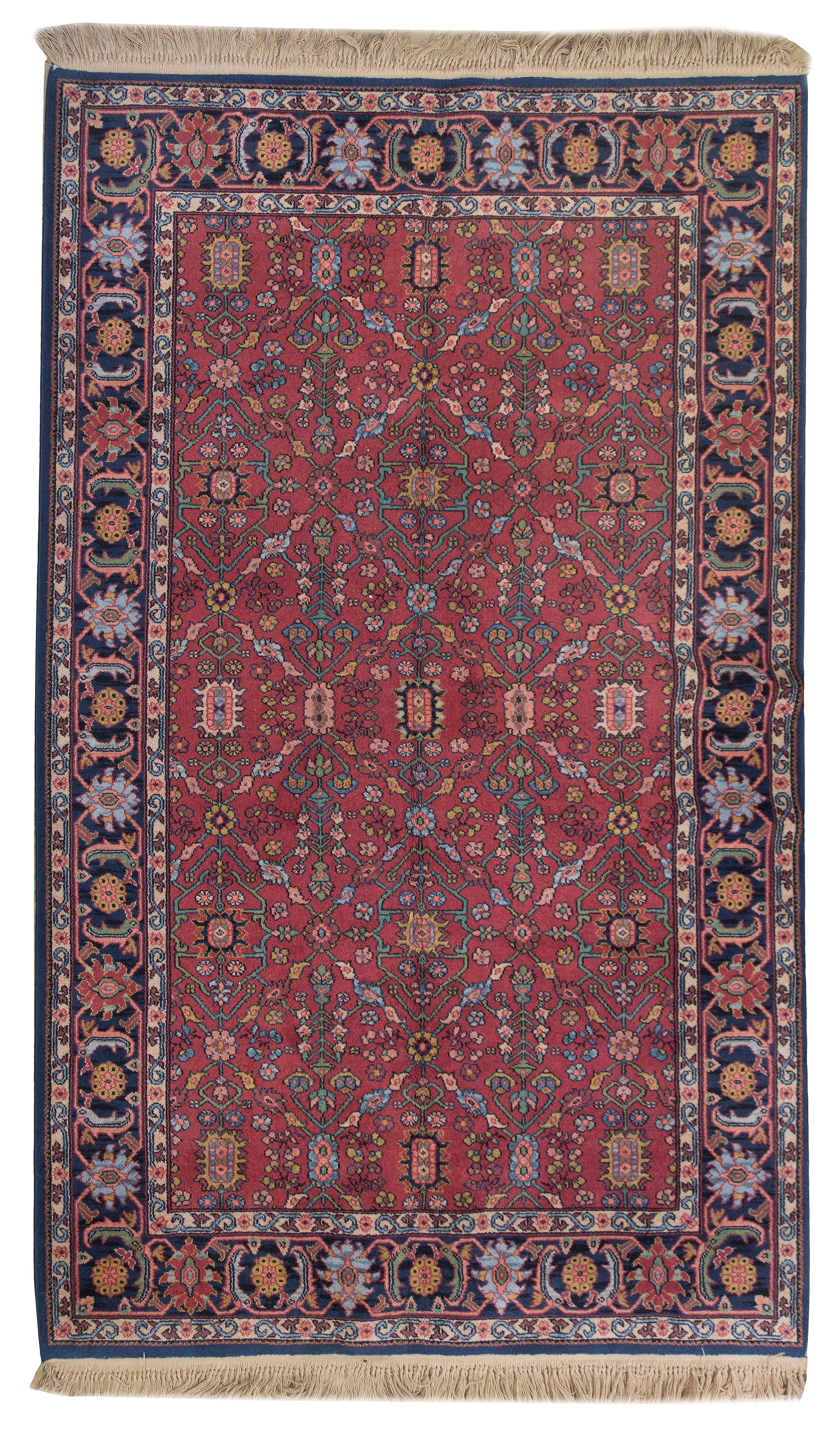 A Persian Wool Rug, 5 feet 10 inches x 9 feet.
