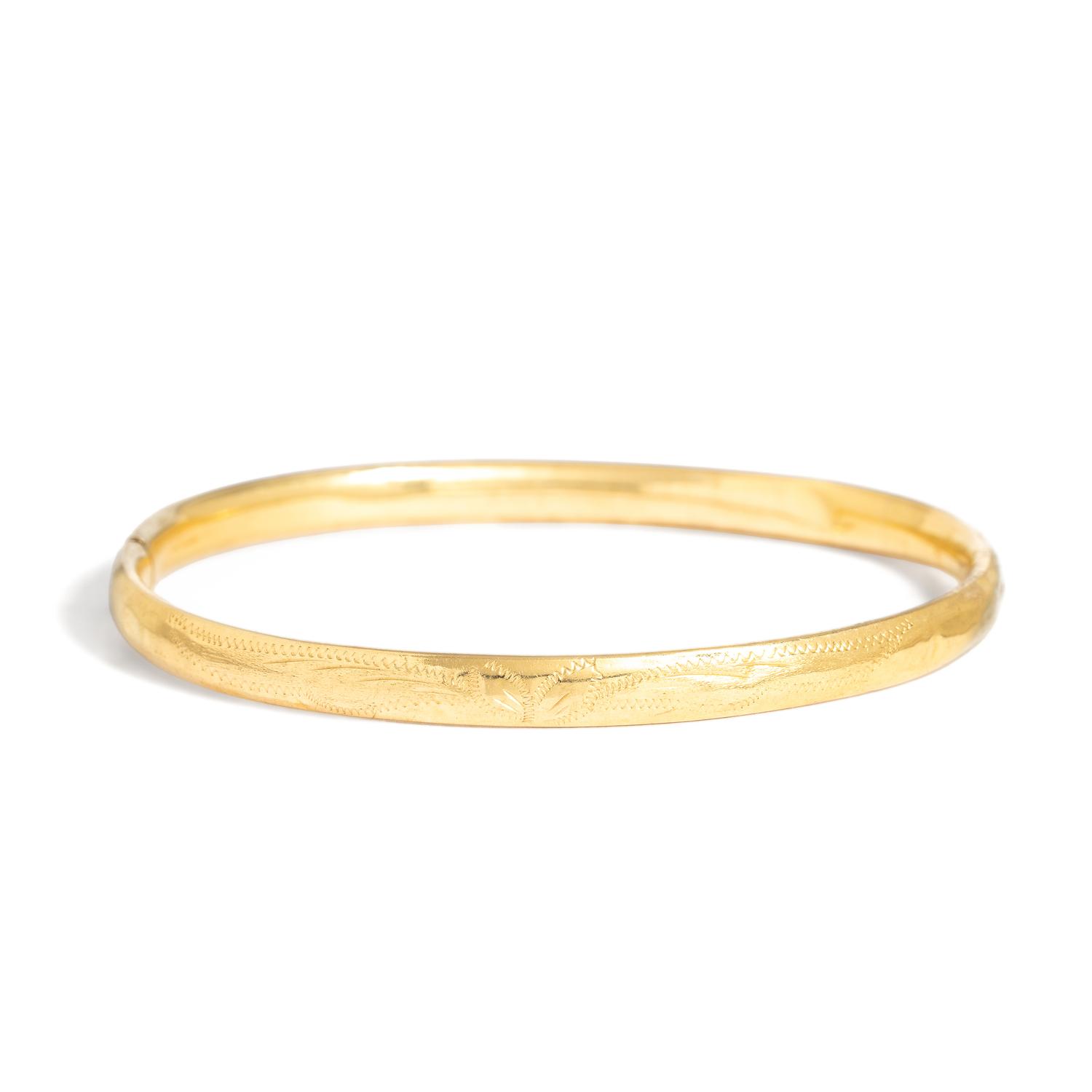 TWO YELLOW GOLD BANGLE BRACELETS