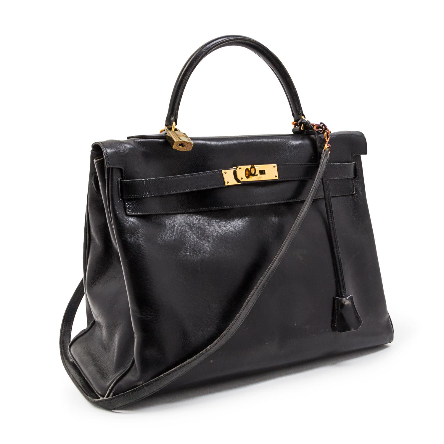 An Hermes 35cm Black Leather Kelly Bag, 14 x 8 x 7 inches.