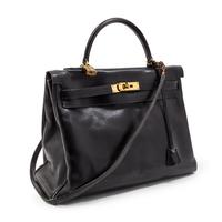 An Hermes 35cm Black Leather Kelly Bag, 14 x 8 x 7 inches.