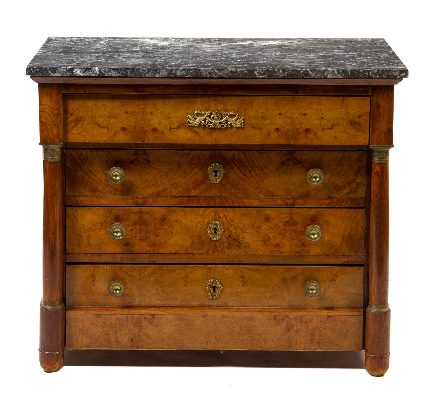 A German Walnut Commode, Height 31 1/3 x width 36 3/4 x depth 23 1/4 inches.