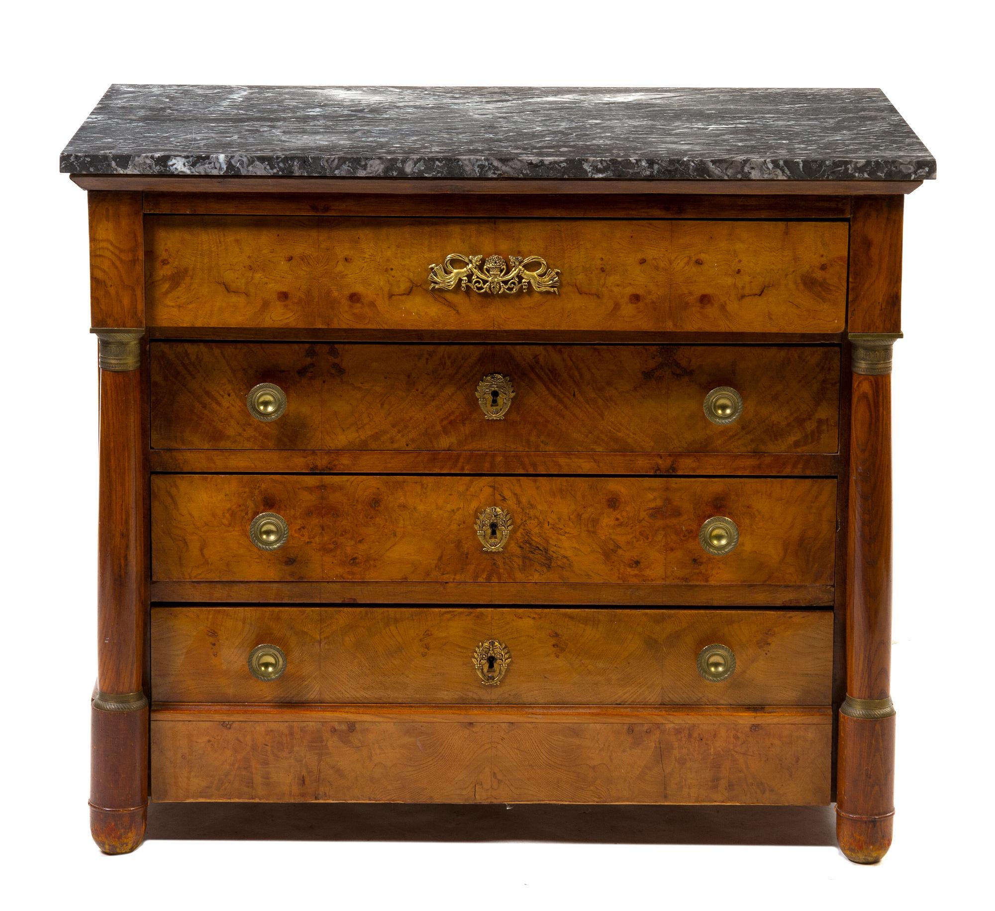 A German Walnut Commode, Height 31 1/3 x width 36 3/4 x depth 23 1/4 inches.