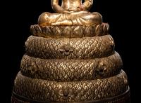 A Large Thait Gilt and Red Lacquered Wood Figure of Buddha