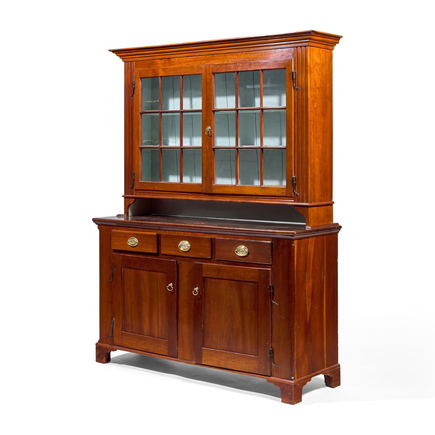 A Chippendale Cherry Step-Back Cupboard