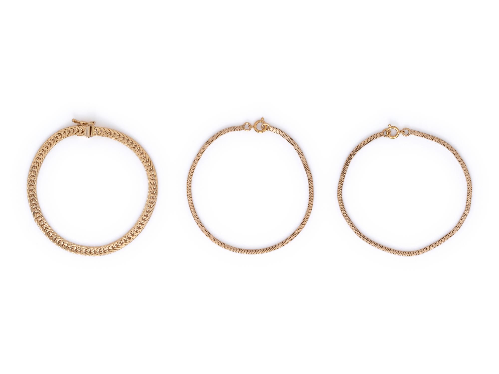 COLLECTION OF YELLOW GOLD BRACELETS