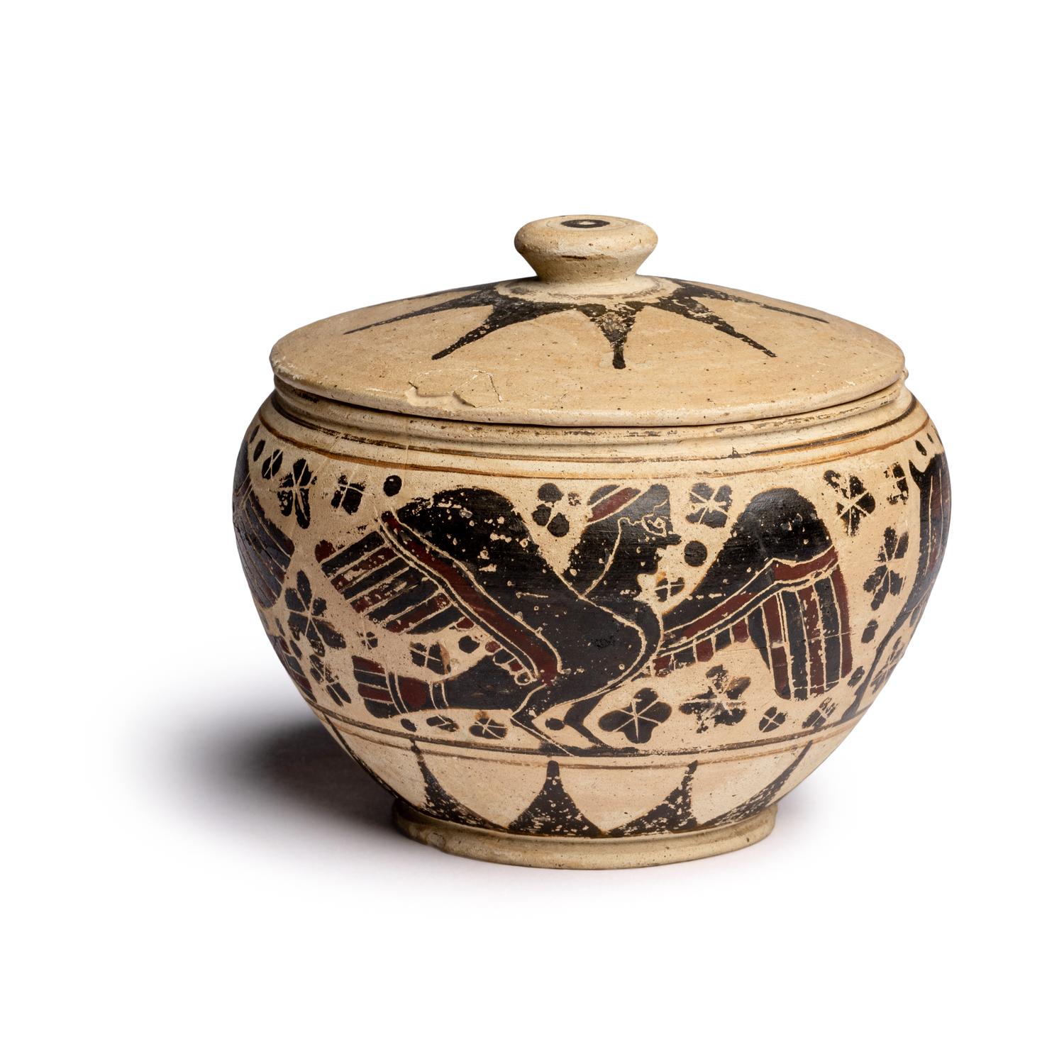 A Corinthian Pottery Lidded Pyxis with Animal Procession