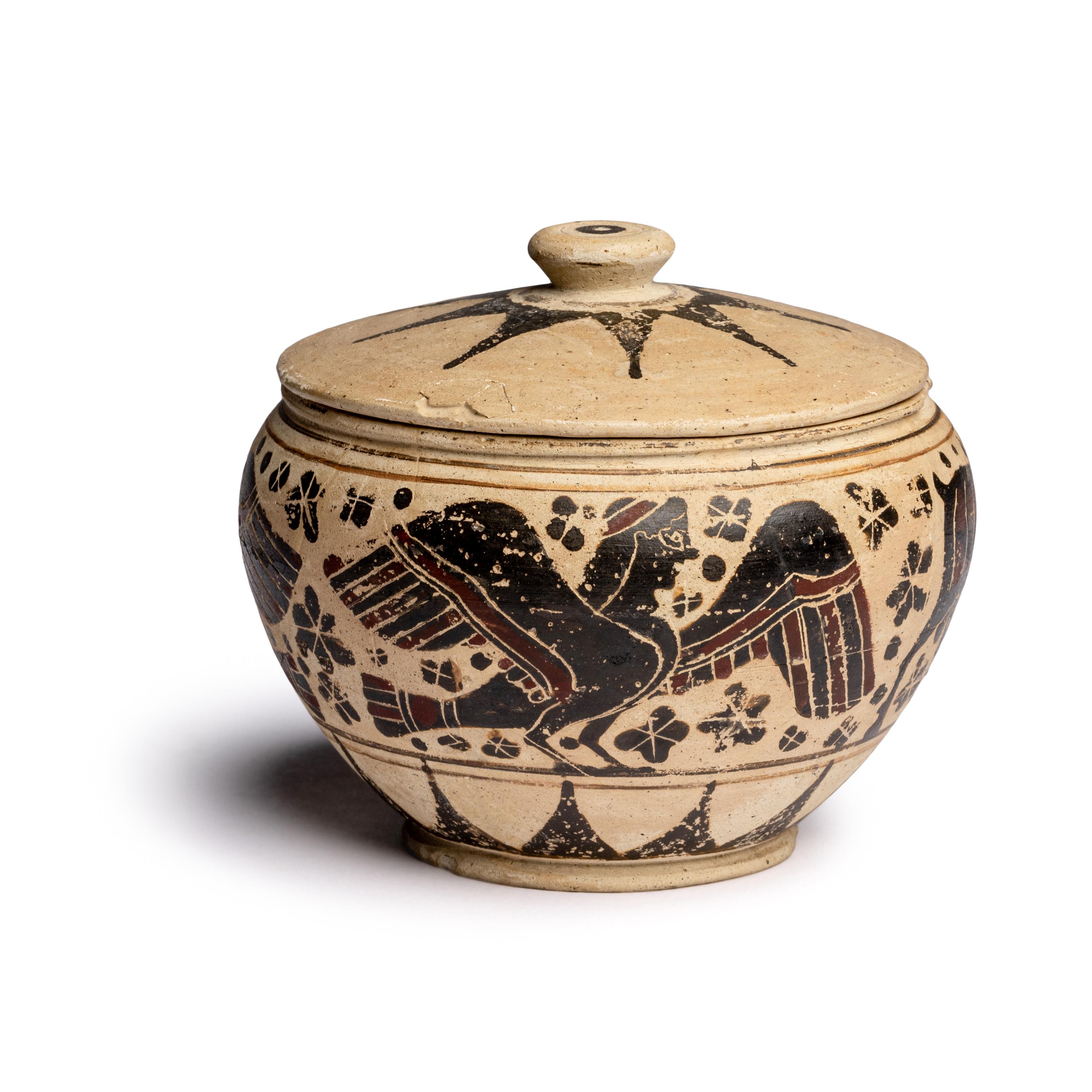A Corinthian Pottery Lidded Pyxis with Animal Procession