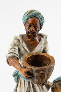 An Austrian Cold-Painted Bronze Figure of a Man With a Jug — EARLY 20TH CENTURY
