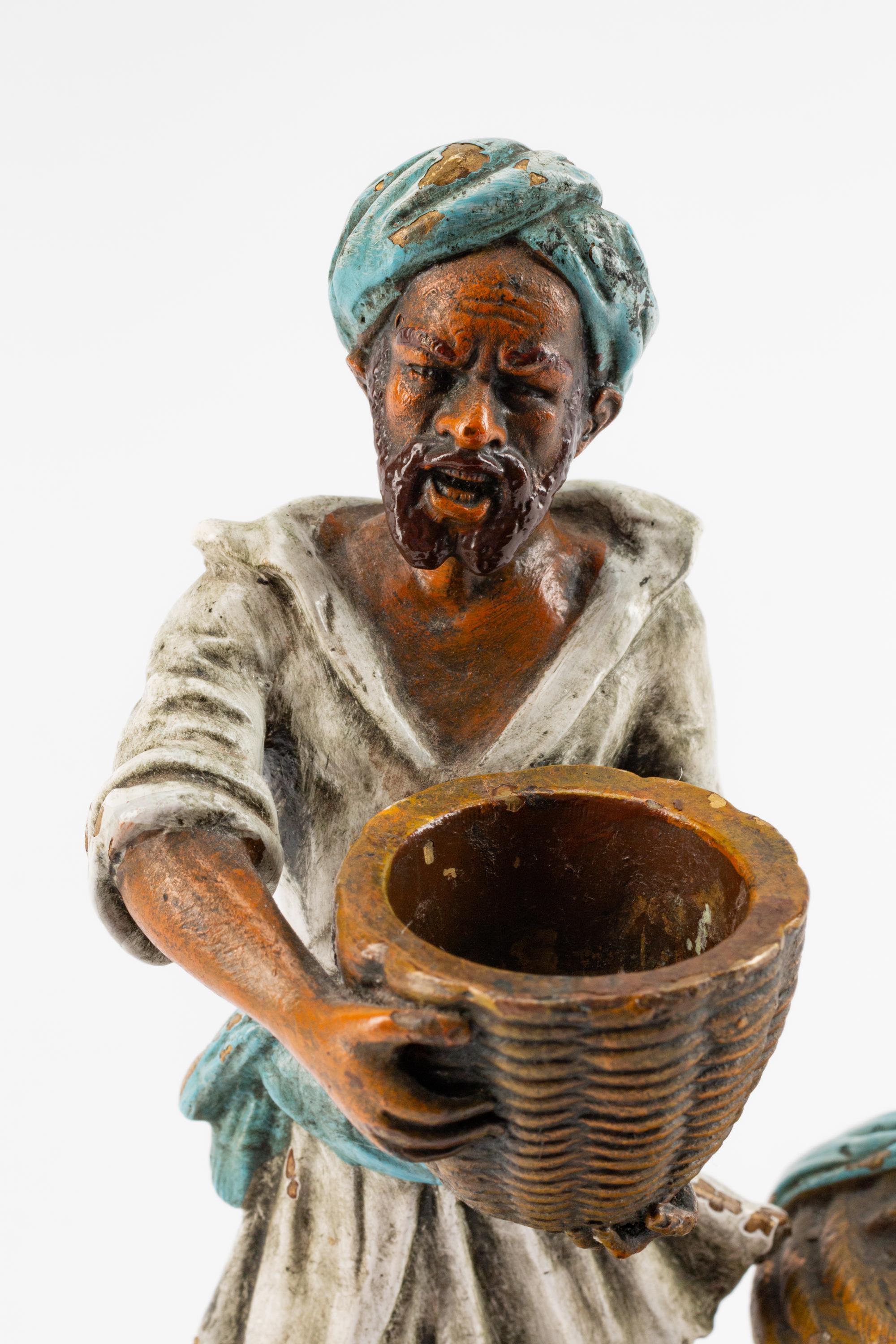 An Austrian Cold-Painted Bronze Figure of a Man With a Jug — EARLY 20TH CENTURY